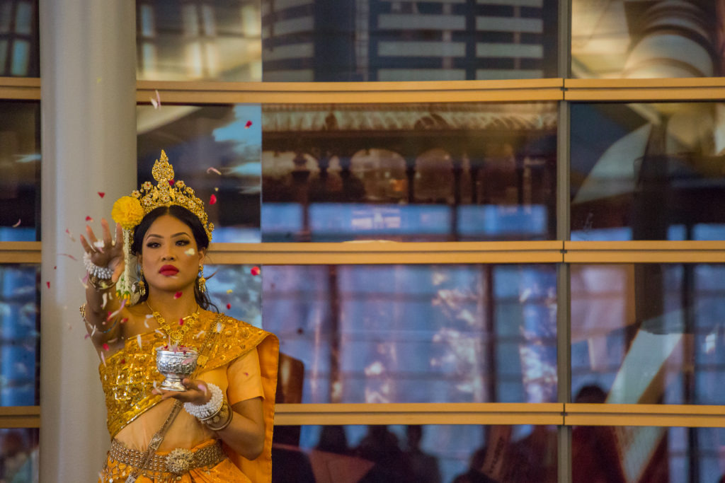 Kimshaina Mao, left, performs, during the ART of Survival at Seattle City Hall in Seattle, Washington, on April 7, 2018. [Carolyn Bick/For the International Examiner]